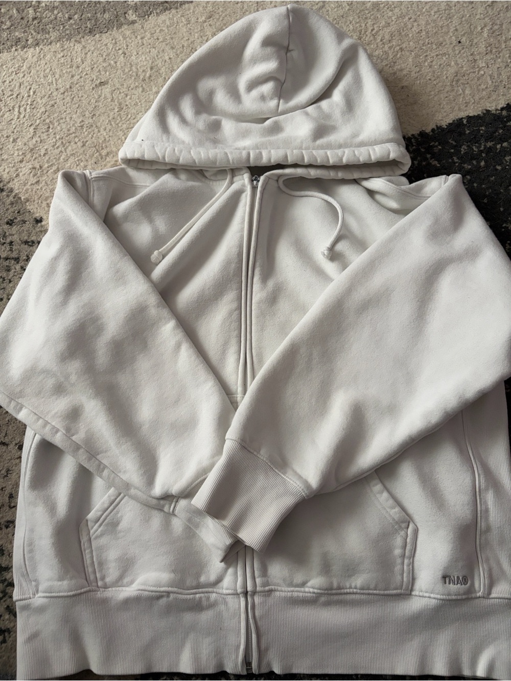 TNA brand zip up